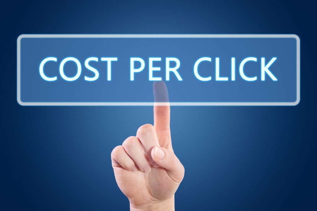 Hand pointing finger at a sign that reads Cost Per Click